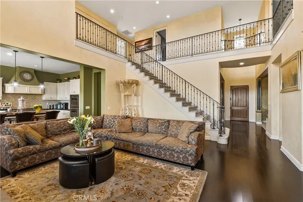 a spacious bedroom with a bed and a fireplace