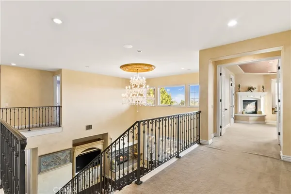 a bath tub sitting in a bathroom next to a window