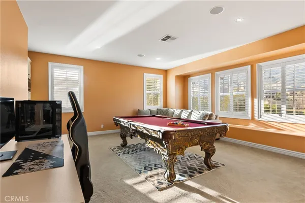 a view of a swimming pool with an ocean view