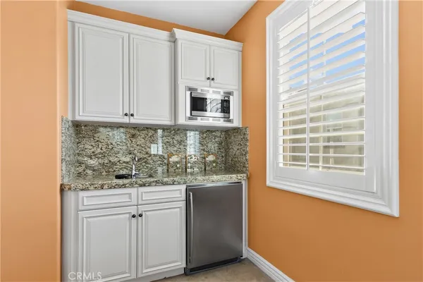 a view of a house with swimming pool