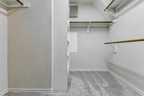 a view of kitchen and hall with wooden floor