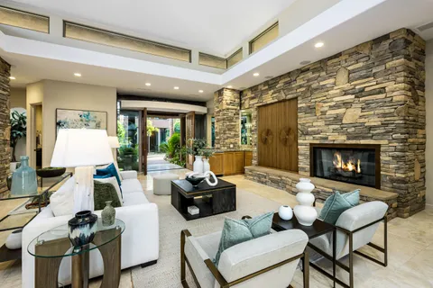 a view of a bunch of flowers in front of a house