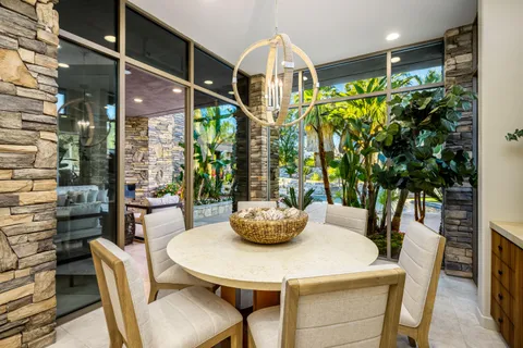 a bathroom with a shower sink and mirror