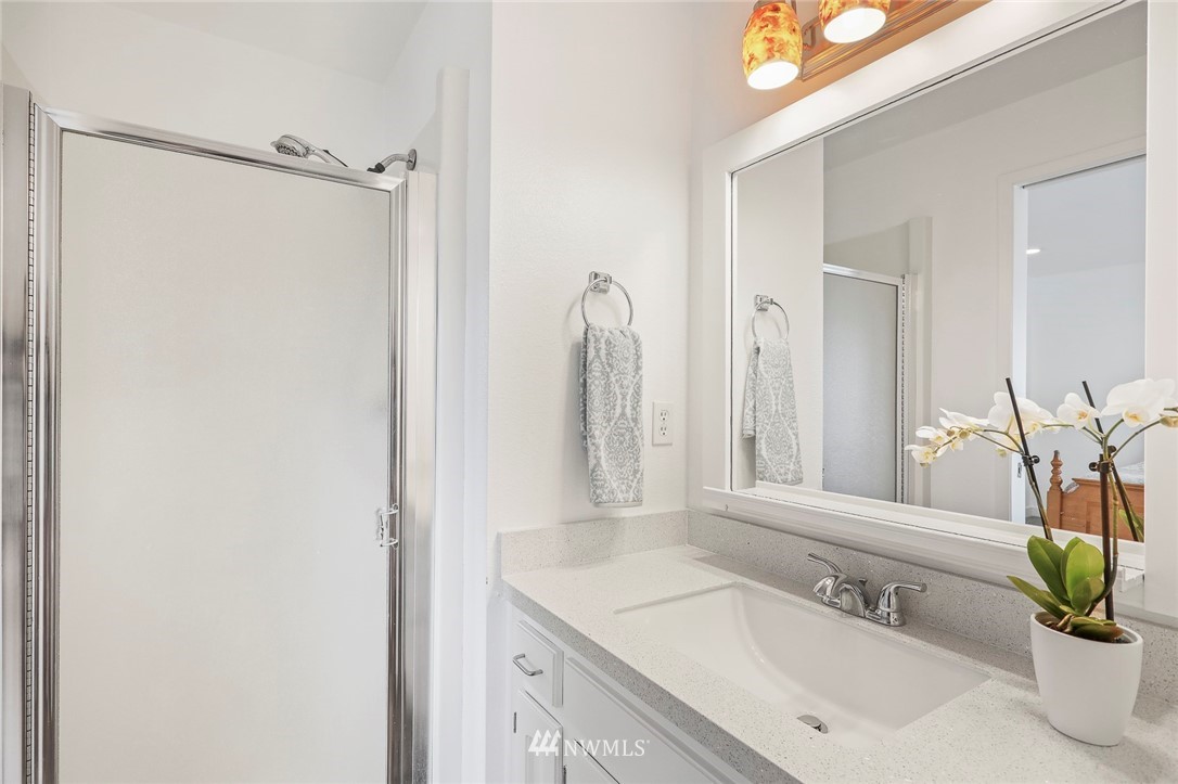 19230 90th Place Northeast Bothell, WA 98011 - Photo 15 of 40 a bathroom with a sink and a mirror