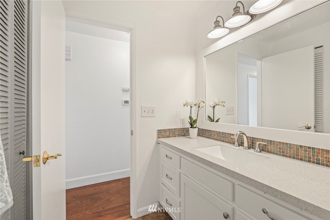 19230 90th Place Northeast Bothell, WA 98011 - Photo 18 of 40 a bathroom with a sink and a mirror