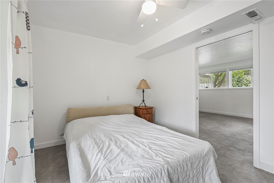 19230 90th Place Northeast Bothell, WA 98011 - Photo 20 of 40 a bedroom with a bed and a window