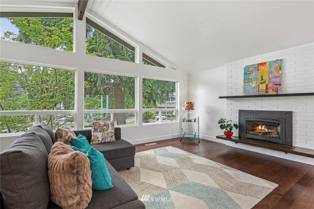 19230 90th Place Northeast Bothell, WA 98011 - Photo 6 of 40 a living room with furniture and a fireplace