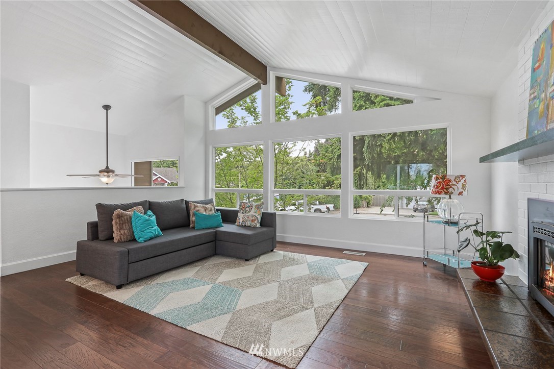 19230 90th Place Northeast Bothell, WA 98011 - Photo 7 of 40 a living room with furniture and a floor to ceiling window