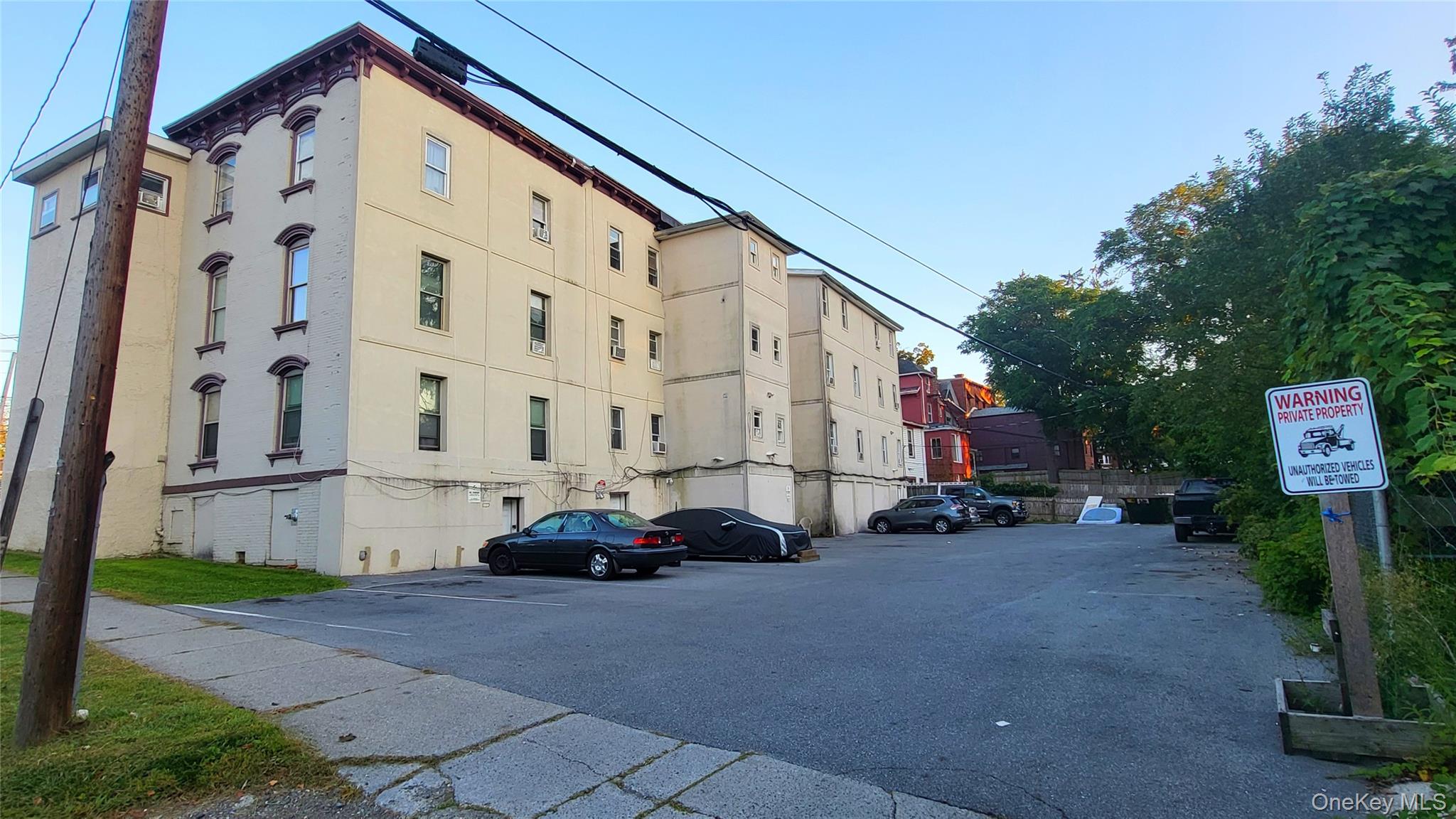 65 South Hamilton Street, Unit 9 Poughkeepsie, NY 12601 - Photo 19 of 20 a car parked in front of a building