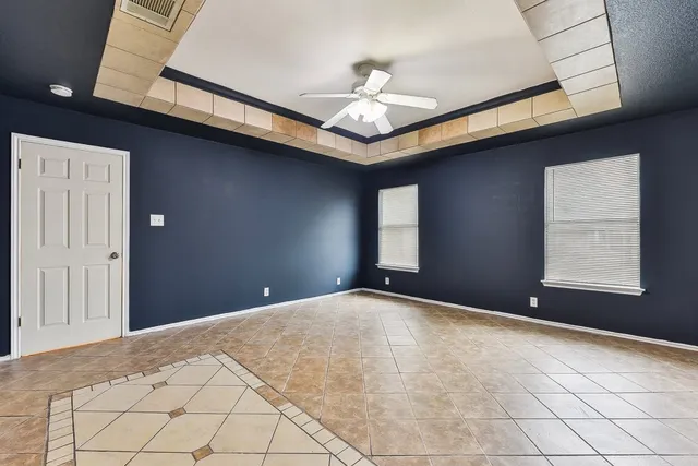 a view of an empty room with window