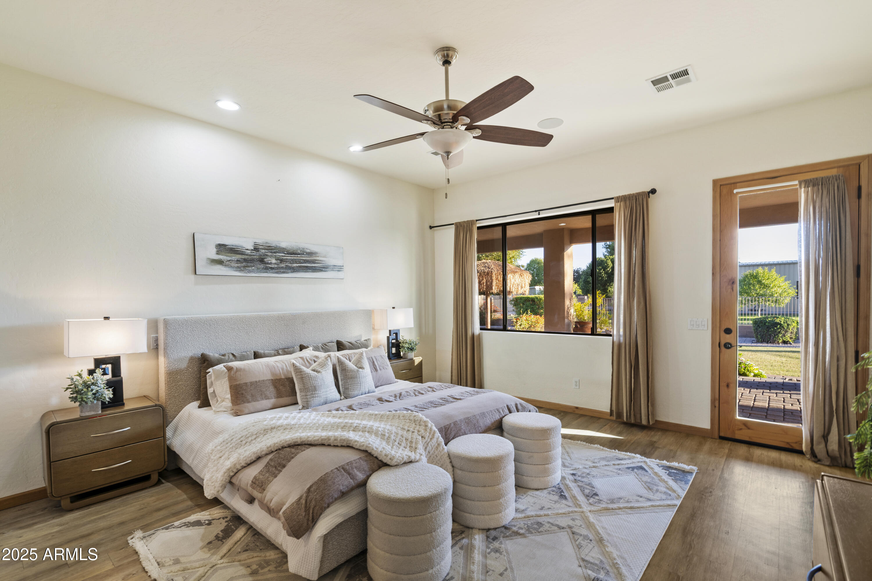 2667 East Melrose Street Gilbert, AZ 85297 - Photo 13 of 32 a bedroom with a large bed and a window