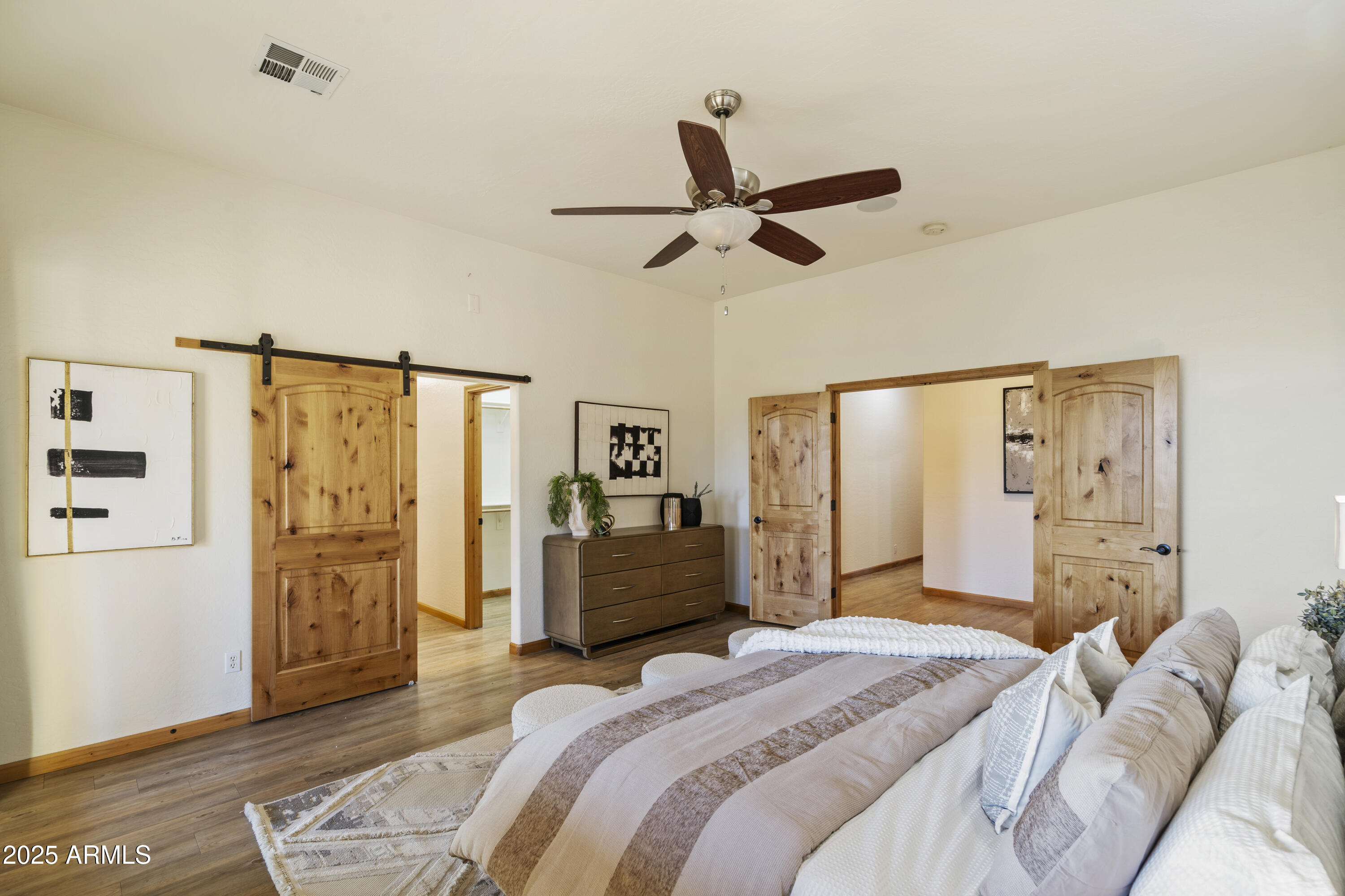 2667 East Melrose Street Gilbert, AZ 85297 - Photo 14 of 32 a bedroom with a bed dresser and a window