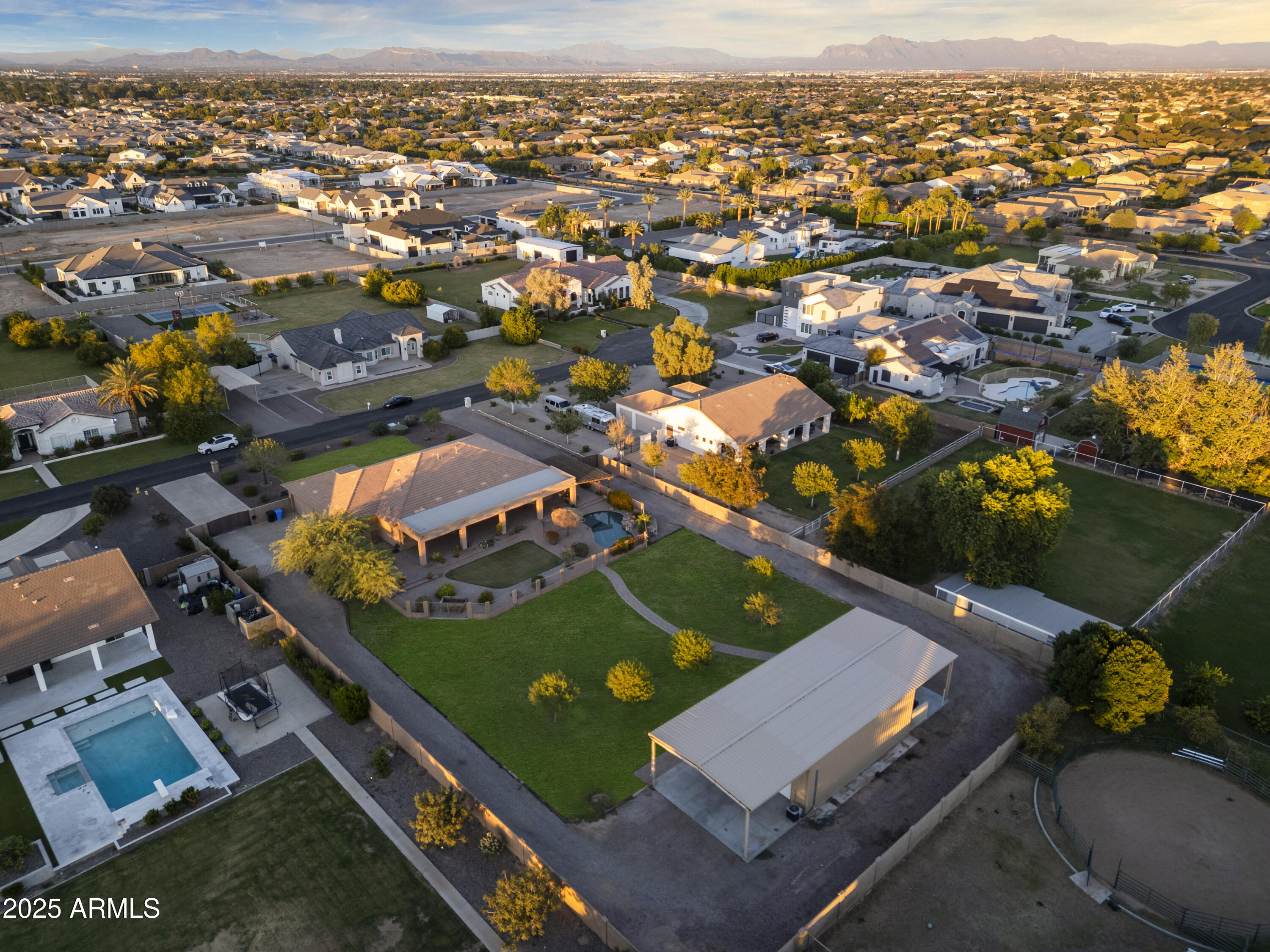 2667 East Melrose Street Gilbert, AZ 85297 - Photo 27 of 32 an aerial view of a city with lots of residential buildings