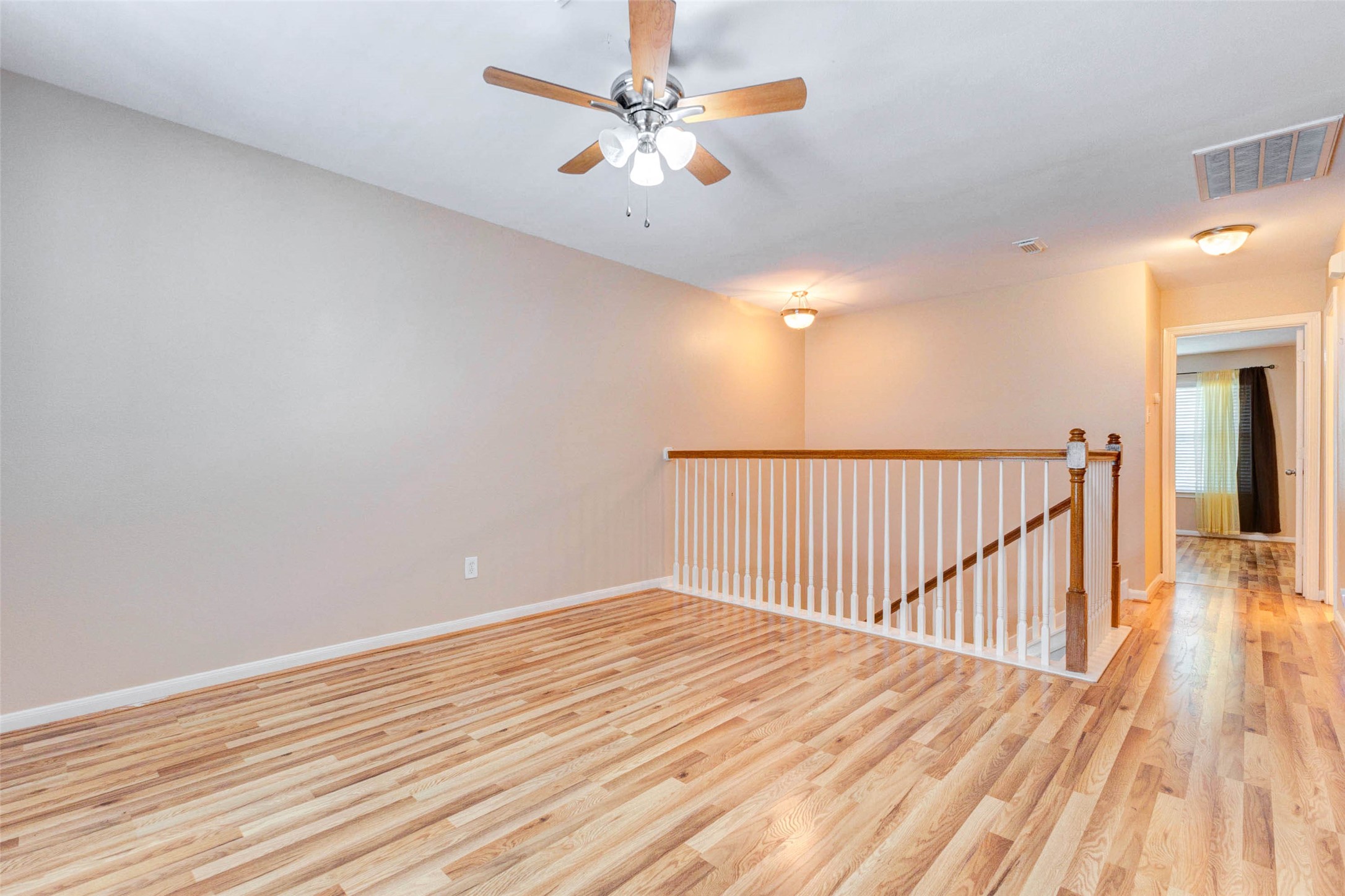 14522 Durham Chase Lane Houston, TX 77095 - Photo 17 of 40 a view of a room with wooden floor