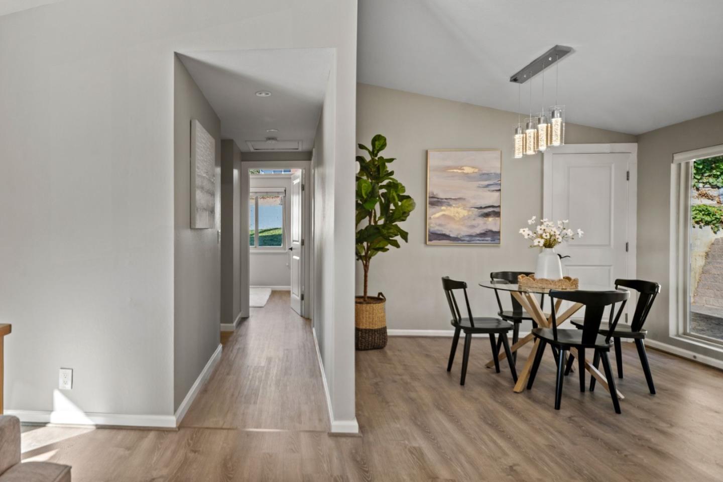 1148 San Lucas Street Seaside, CA 93955 - Photo 11 of 27 a view of a dining room with furniture and wooden floor