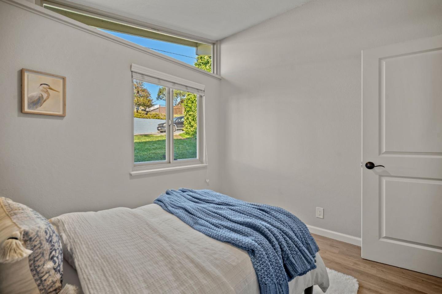 1148 San Lucas Street Seaside, CA 93955 - Photo 18 of 27 a bedroom with a bed and a window