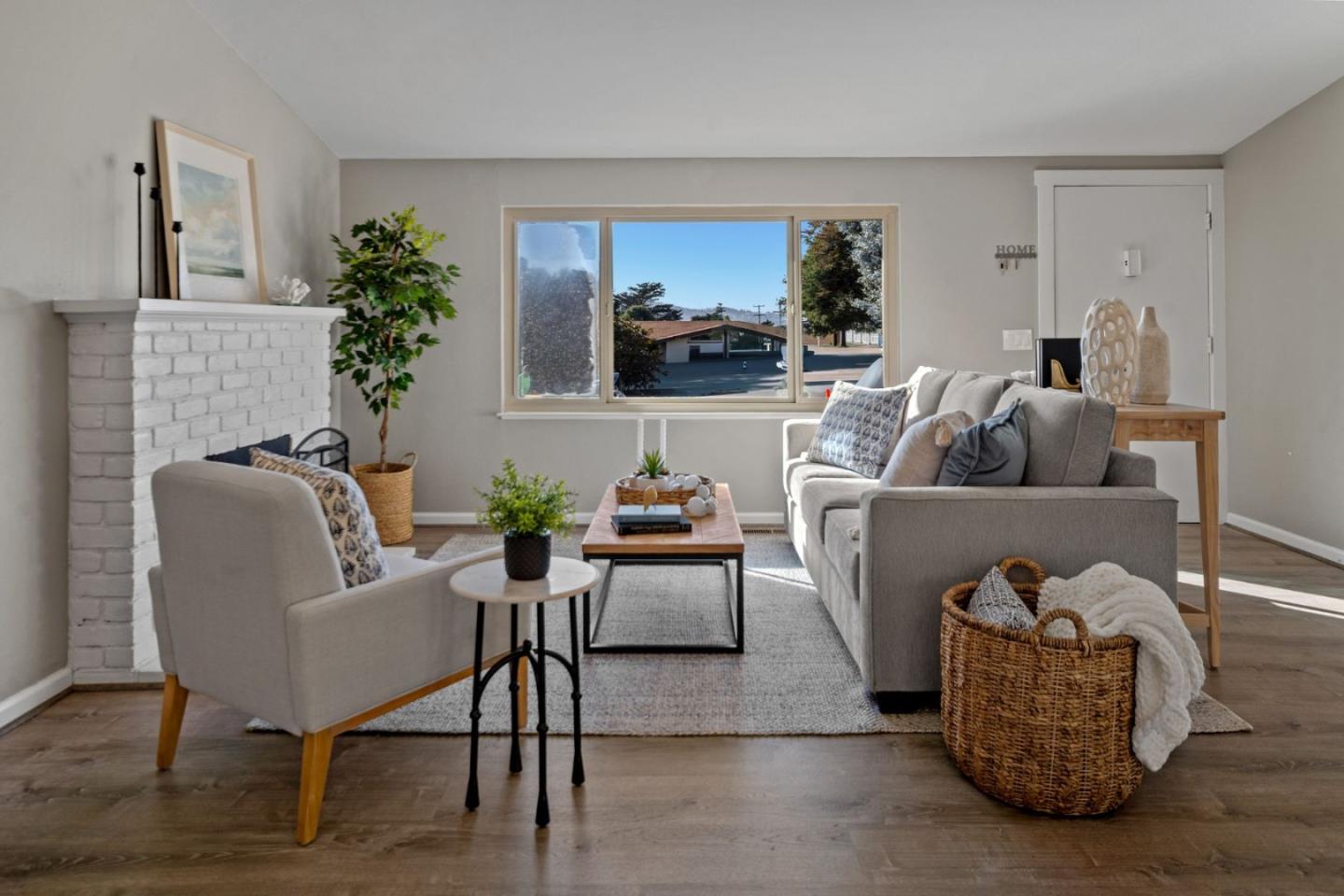 1148 San Lucas Street Seaside, CA 93955 - Photo 3 of 27 a living room with furniture and a potted plant