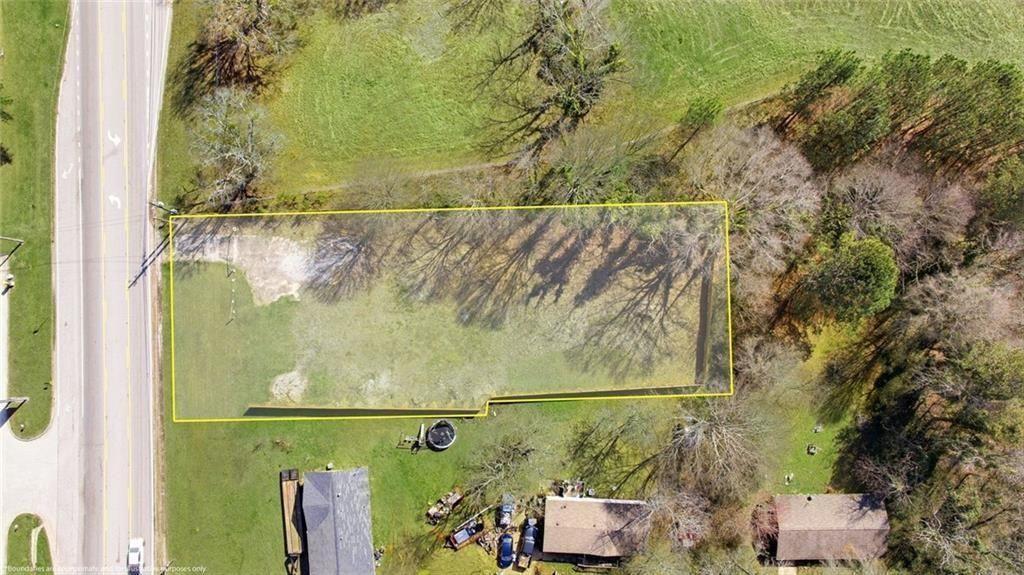 5323 Thompson Bridge Road Murrayville, GA 30564 - Photo 27 of 33 an aerial view of a house with a yard
