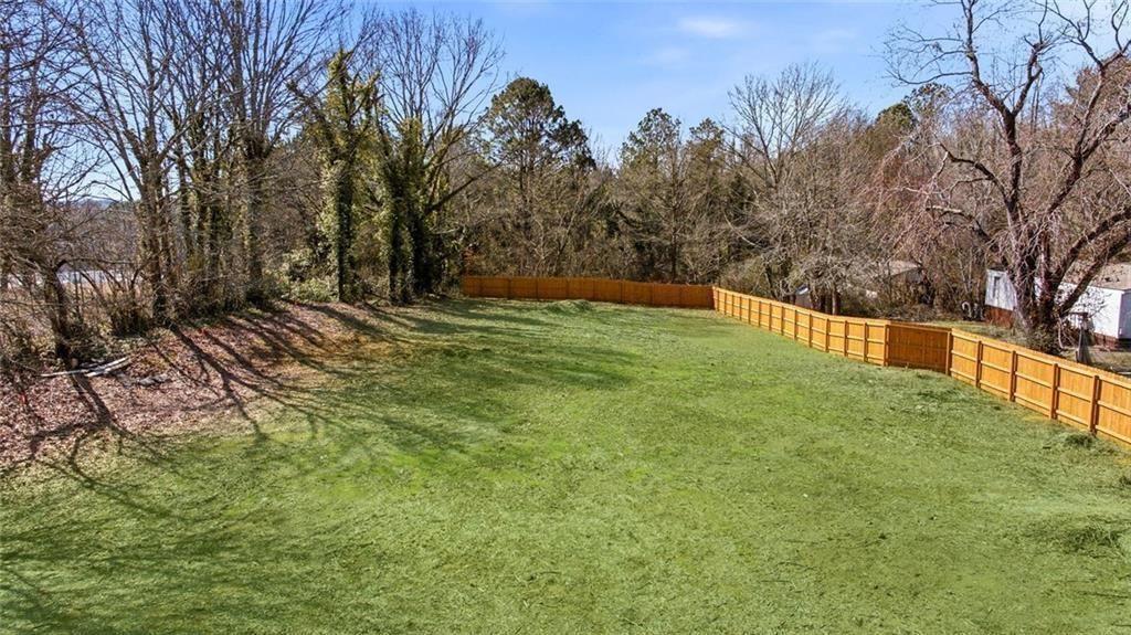 5323 Thompson Bridge Road Murrayville, GA 30564 - Photo 8 of 33 a view of a backyard