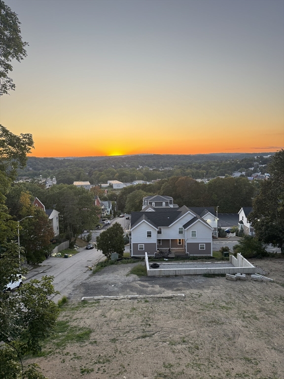 19 Perkins Street Worcester, MA 01605 - Photo 4 of 5 an aerial view of residential houses with outdoor space