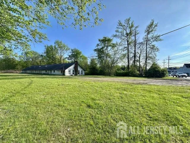 a view of a garden and basketball court