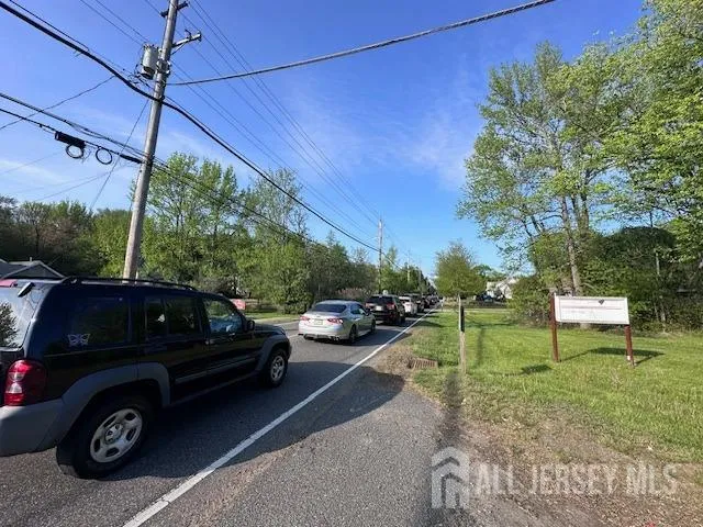 a view of a car parked in front of a house