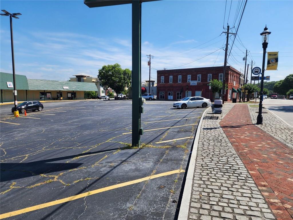 6958 Main Street Lithonia, GA 30058 - Photo 55 of 55 a view of a street with cars