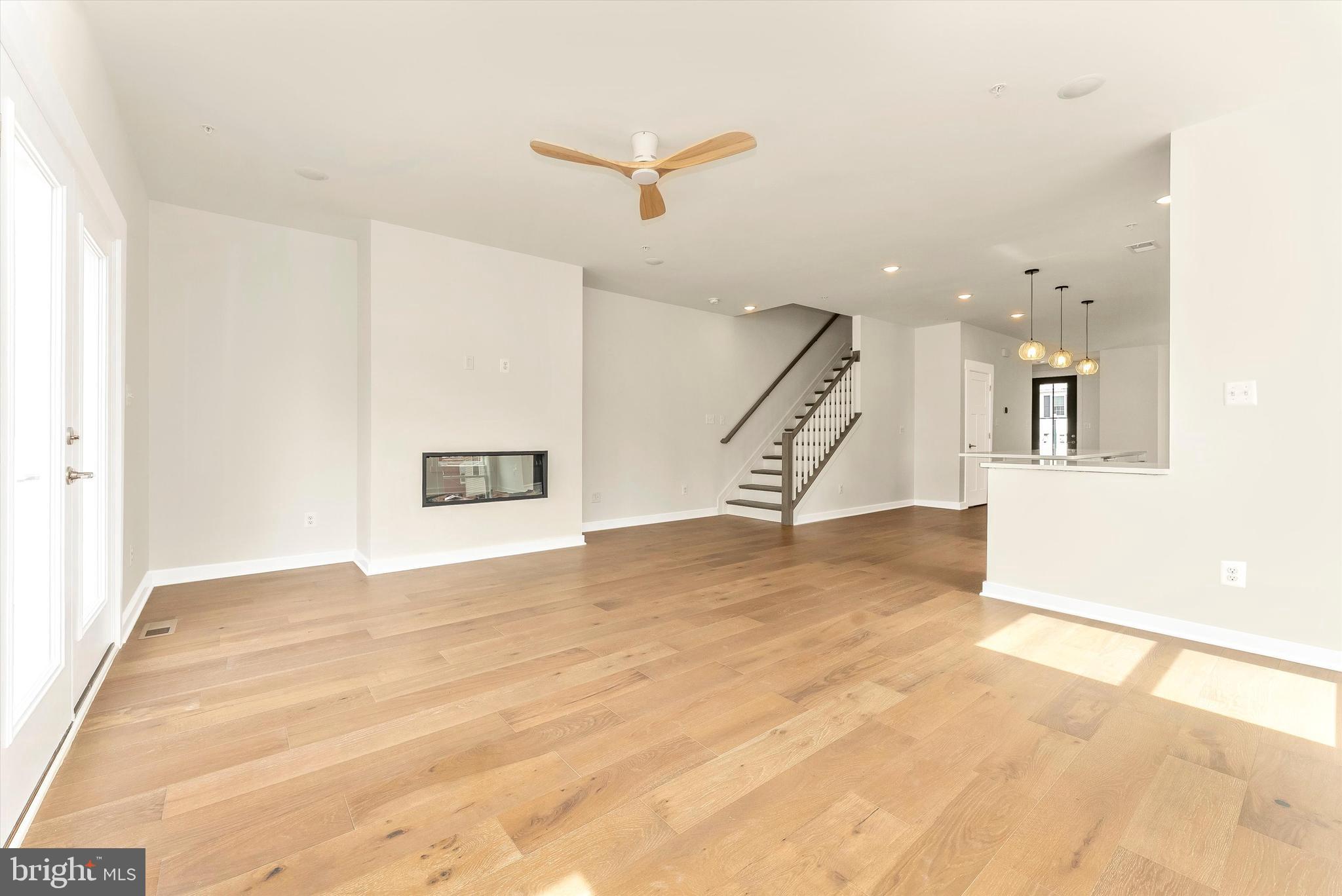 328 Madison Street Frederick, MD 21701 - Photo 16 of 49 a view of a livingroom with a staircase