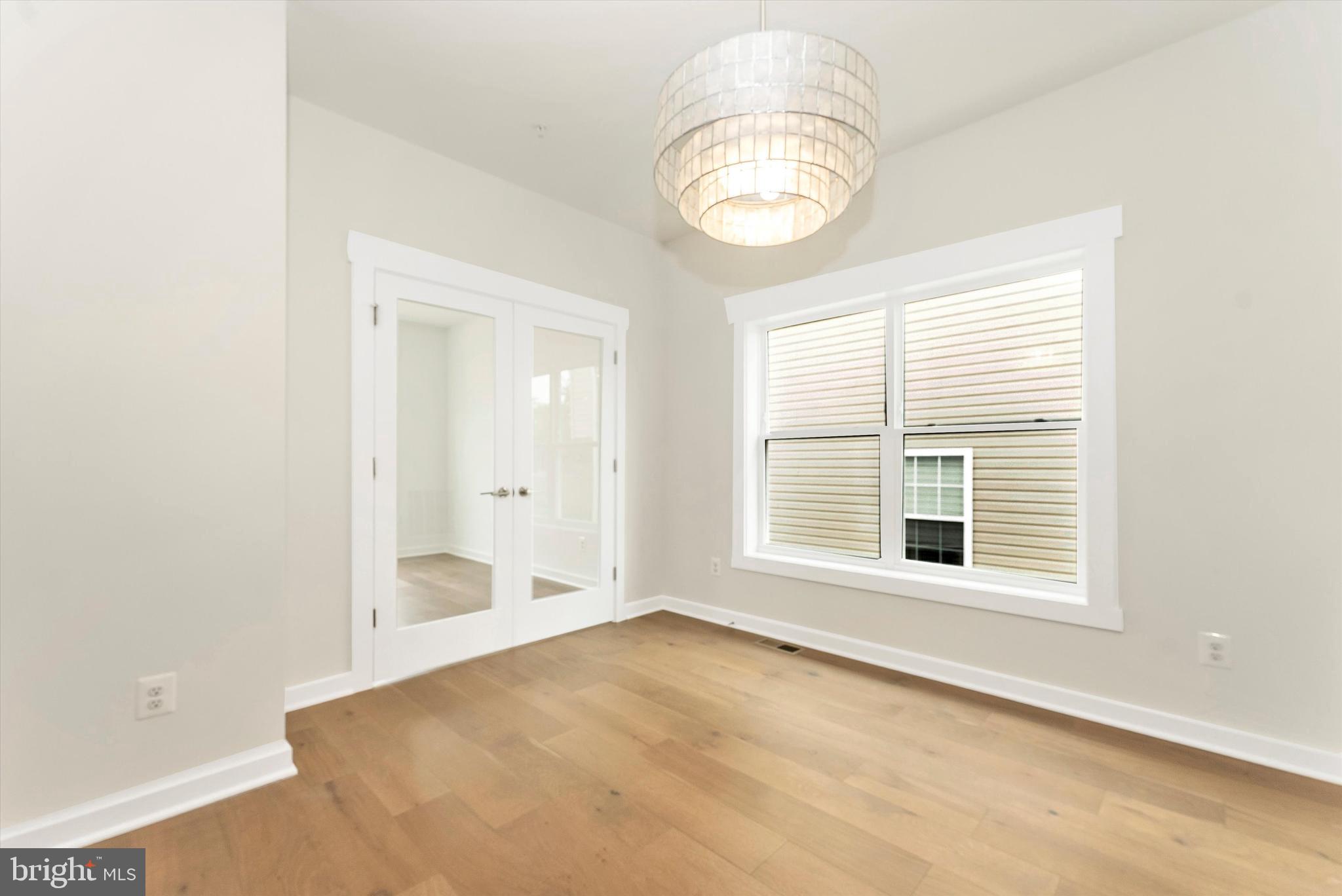 328 Madison Street Frederick, MD 21701 - Photo 21 of 49 an empty room with a window