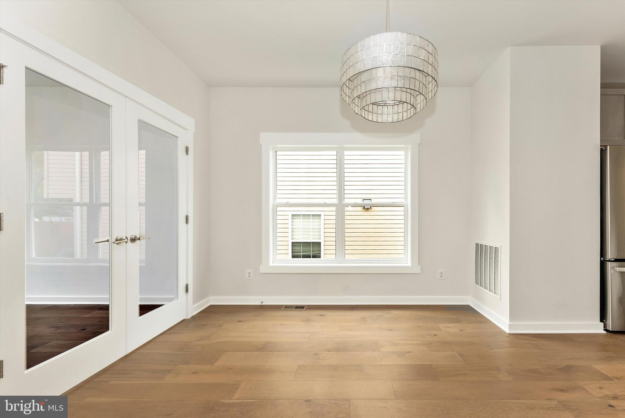 328 Madison Street Frederick, MD 21701 - Photo 23 of 49 a view of an empty room with a window