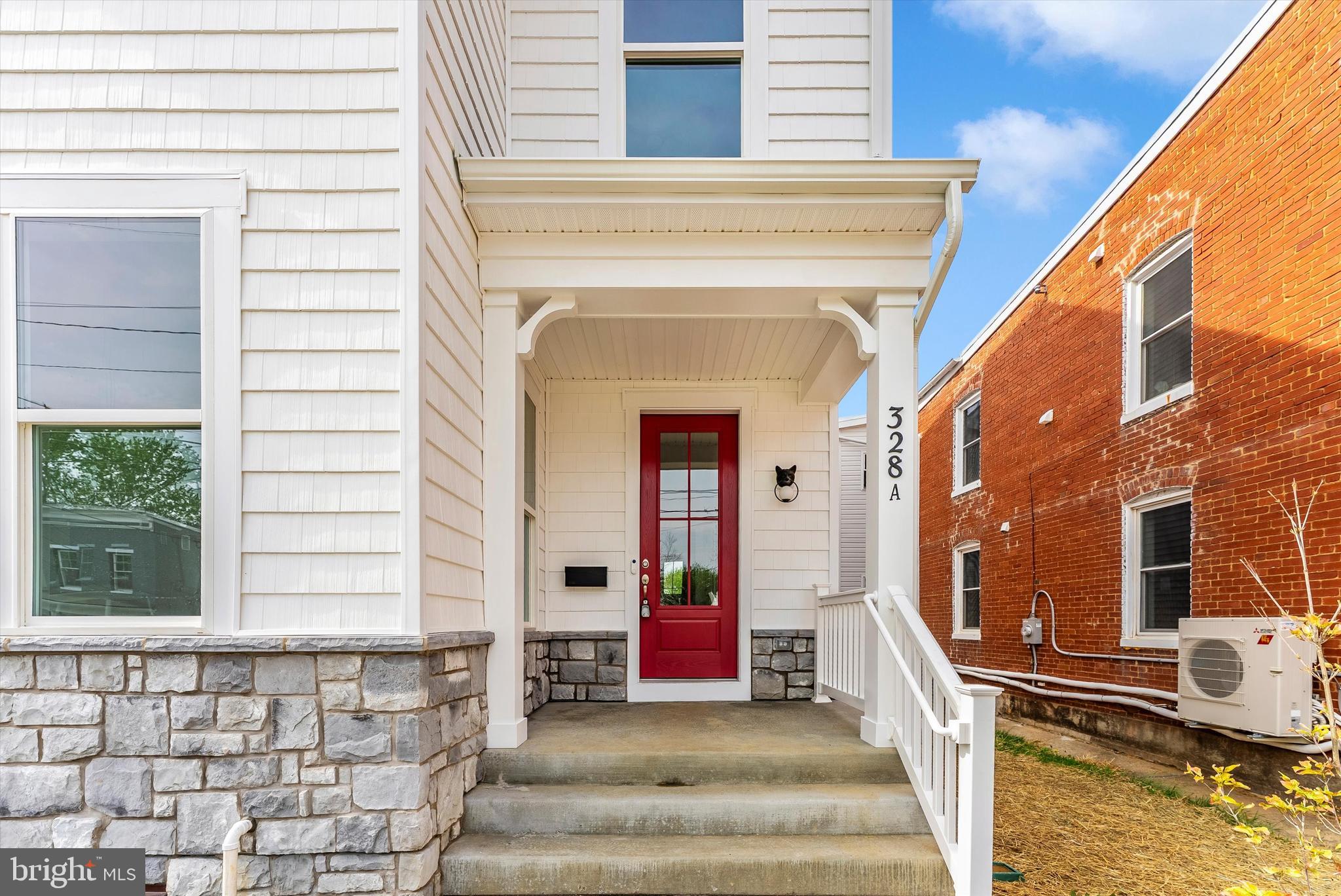 328 Madison Street Frederick, MD 21701 - Photo 3 of 49 a view of a building with sitting area