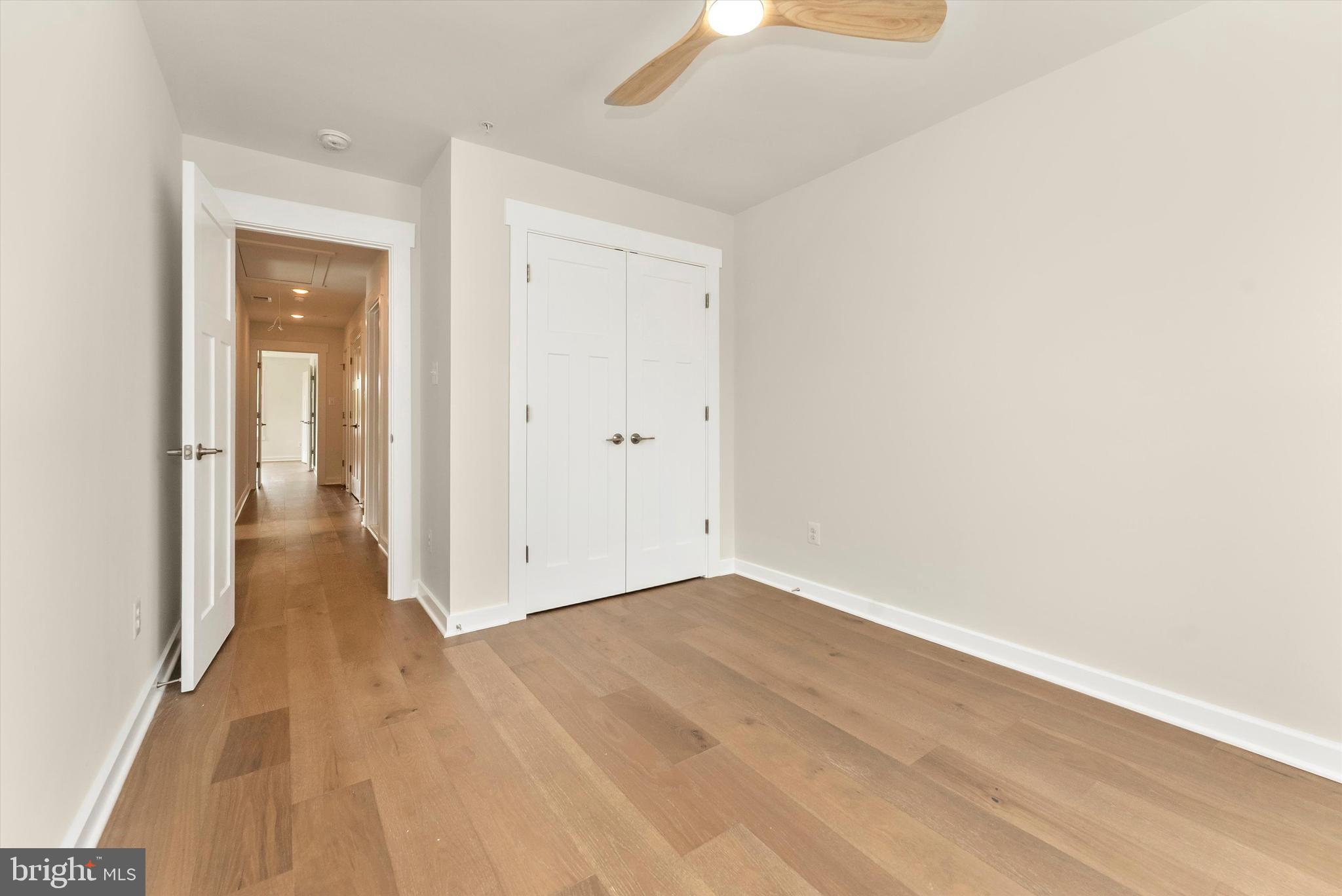 328 Madison Street Frederick, MD 21701 - Photo 35 of 49 a view of a hallway with wooden floor