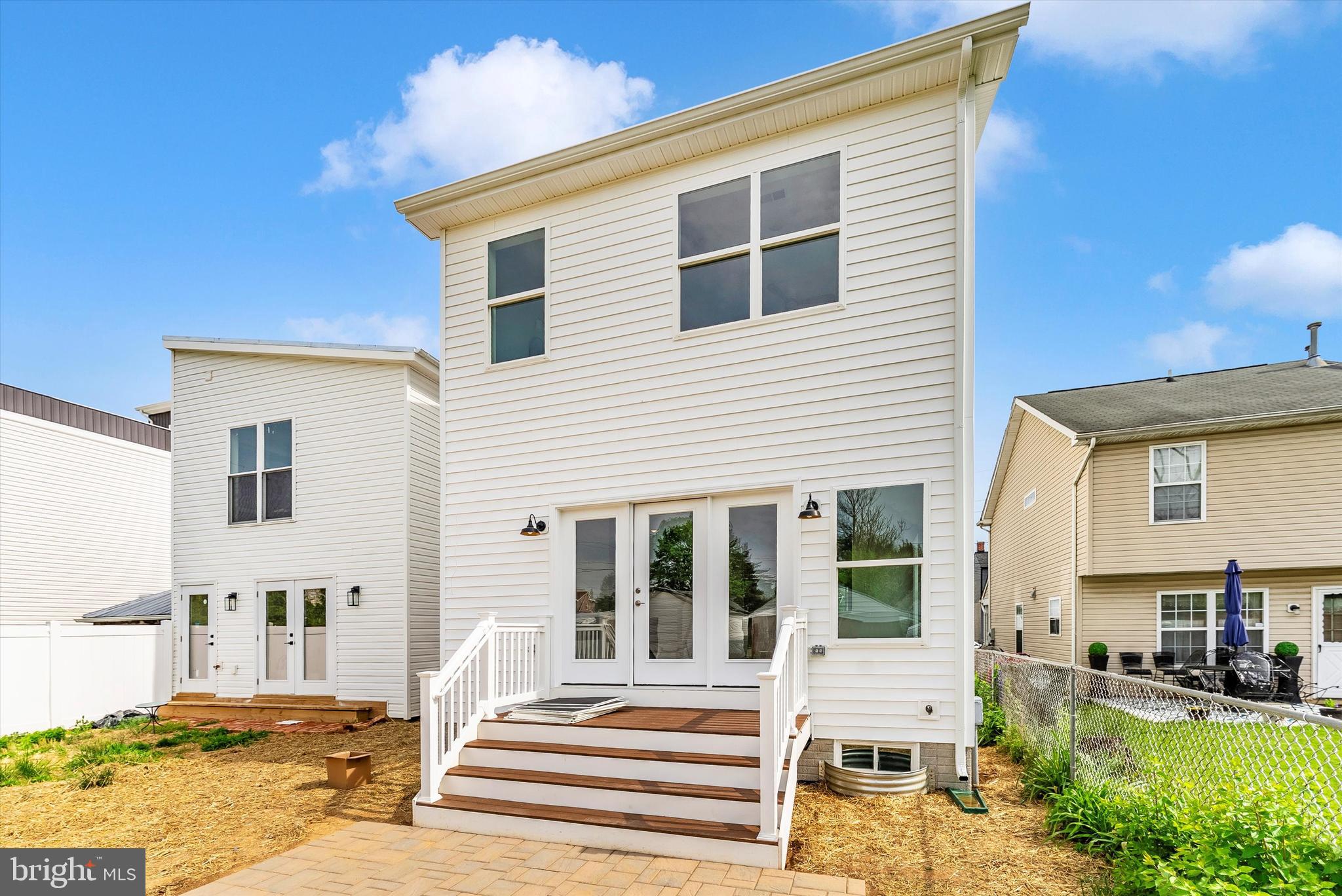 328 Madison Street Frederick, MD 21701 - Photo 43 of 49 a front view of a house with a patio