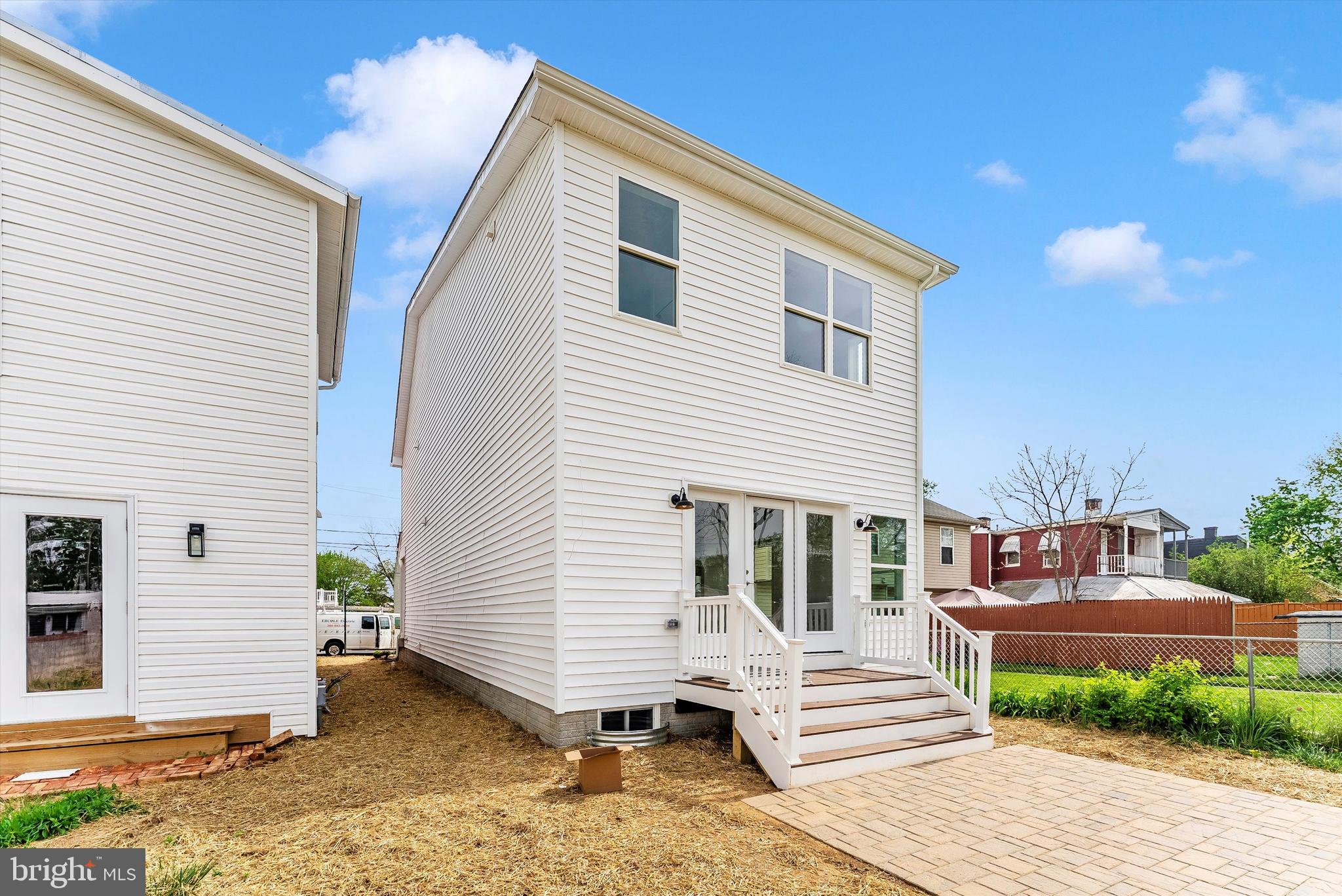 328 Madison Street Frederick, MD 21701 - Photo 44 of 49 a front view of a house with a yard