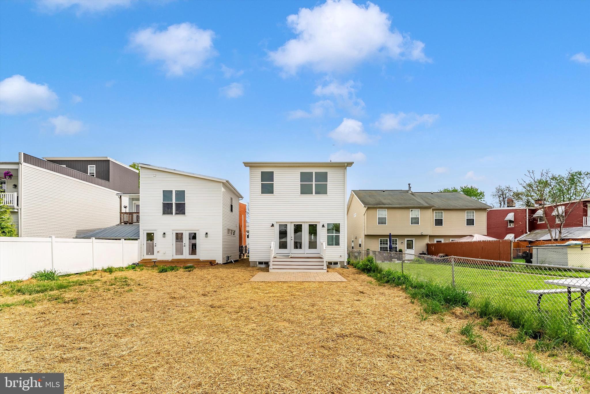 328 Madison Street Frederick, MD 21701 - Photo 45 of 49 a front view of a house with a yard