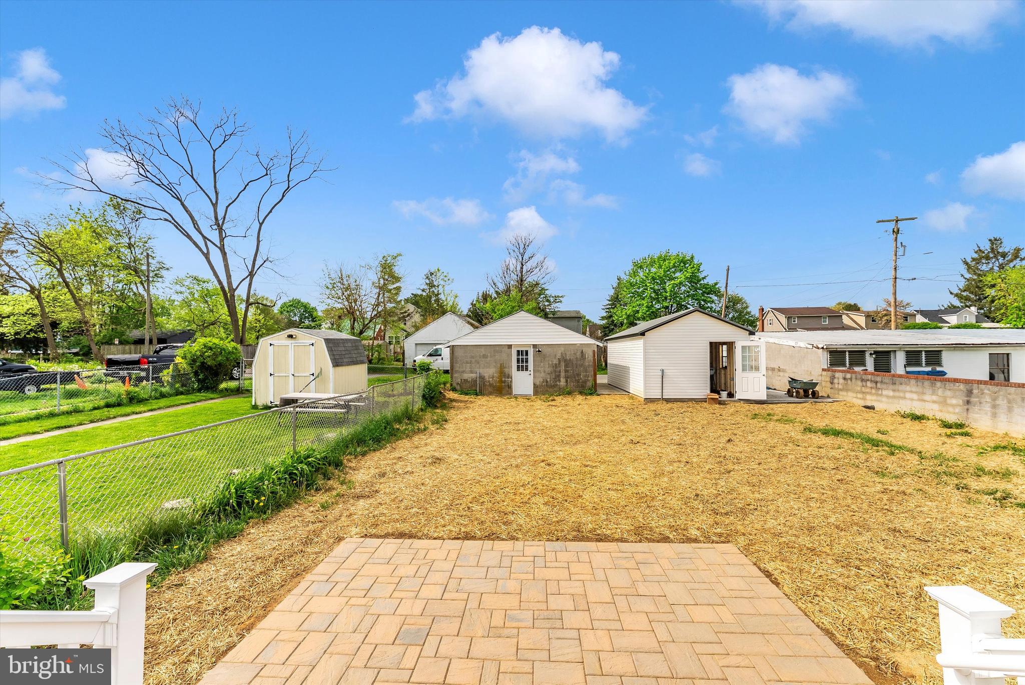 328 Madison Street Frederick, MD 21701 - Photo 46 of 49 a front view of a house with a yard and trees