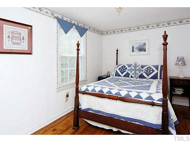 1291 Ennis Road Angier, NC 27501 - Photo 11 of 24 This bedroom also has a sitting area.