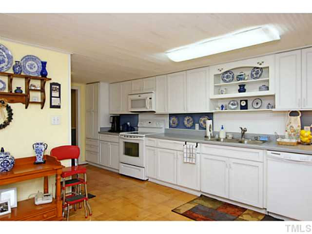 1291 Ennis Road Angier, NC 27501 - Photo 8 of 24 Lots of open space in this kitchen.