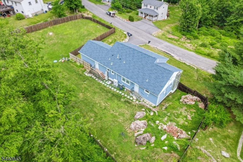 36 Forest Road Andover, NJ 07821 - Photo 14 of 50 an aerial view of a house with a yard
