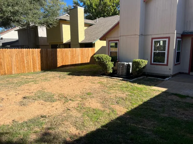 a bathroom with a sink and a yard