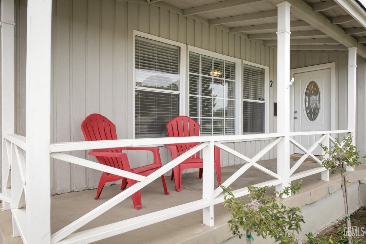 a front view of a house with a porch