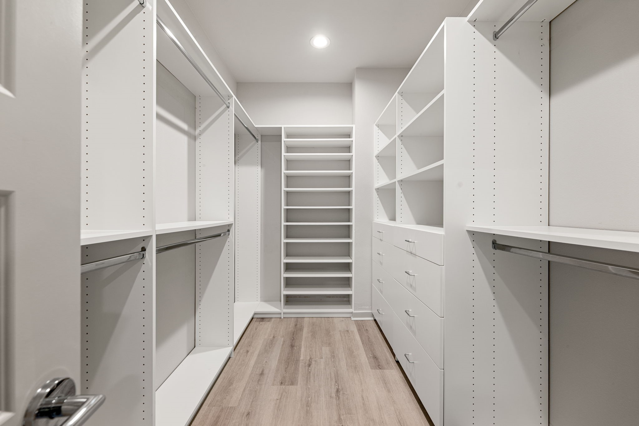 5722 Rucio Lane, Unit A Houston, TX 77092 - Photo 17 of 29 Custom walk-in primary closet with built-in storage.