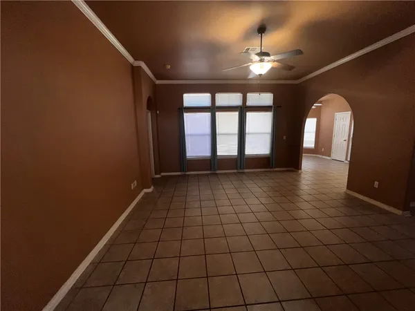 a view of an empty room and window