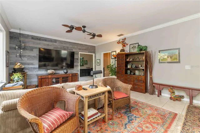 a bedroom with furniture a bed and a window