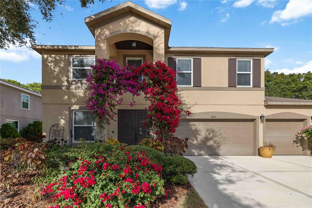 3907 62nd Terrace East Bradenton, FL 34203 - Photo 3 of 63 a front view of a house with a yard