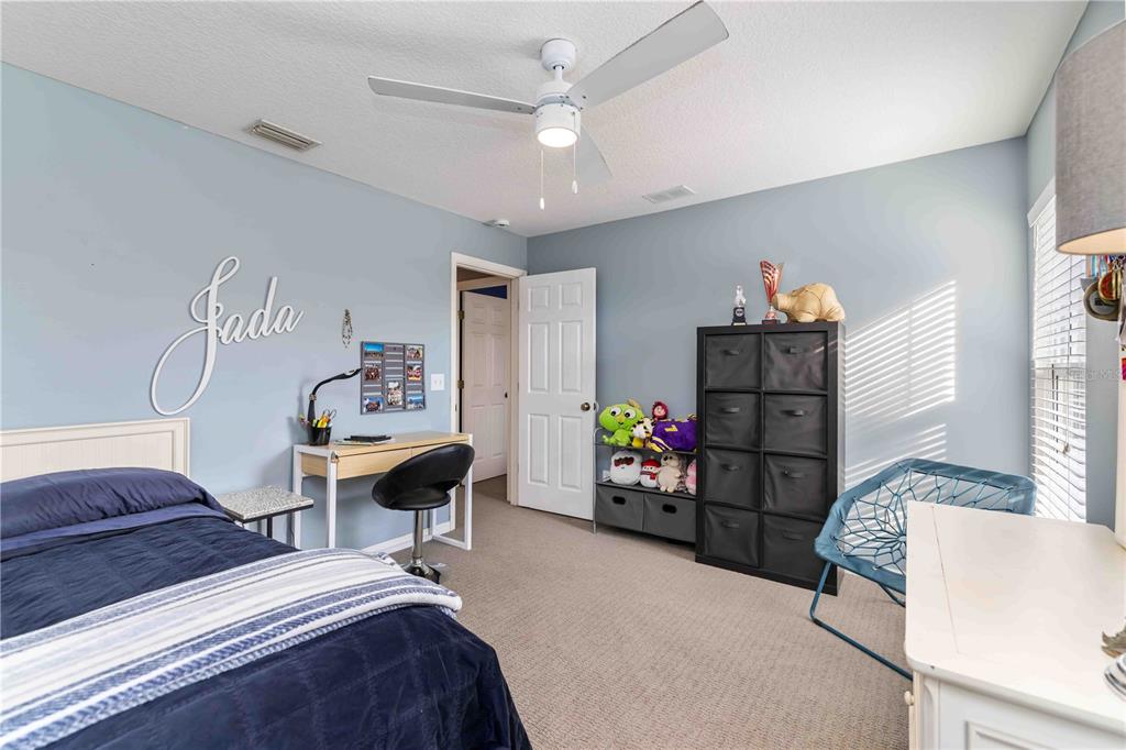 3907 62nd Terrace East Bradenton, FL 34203 - Photo 37 of 63 a bedroom with furniture a bed and a window