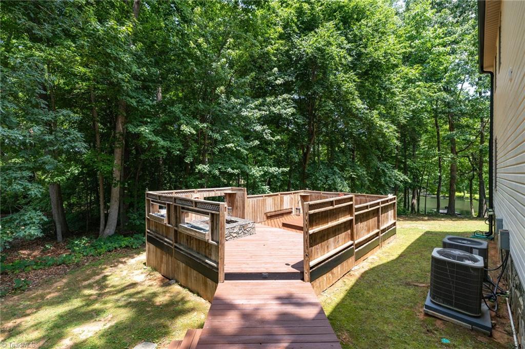 2800 Spencers Grove Road Browns Summit, NC 27214 - Photo 38 of 49 View of another deck with the fire pit.
