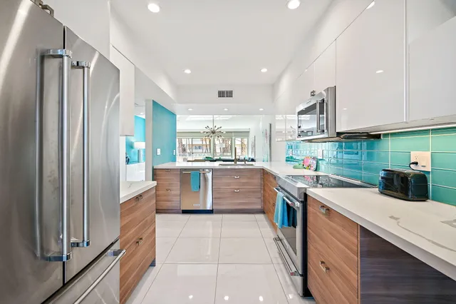 a kitchen with a microwave and stove