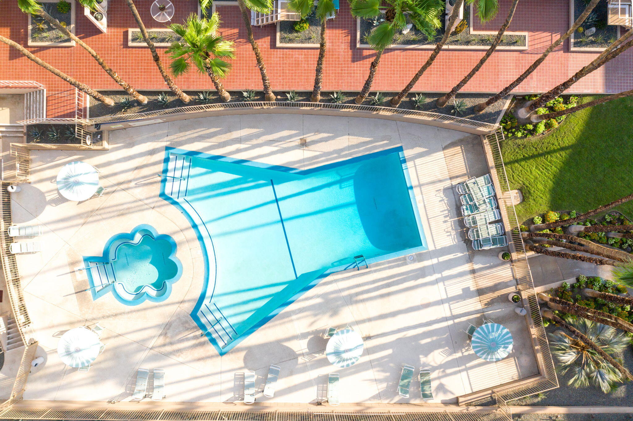 277 East Alejo Road, Unit 215 Palm Springs, CA 92262 - Photo 28 of 52 a view of a street with a building in the background