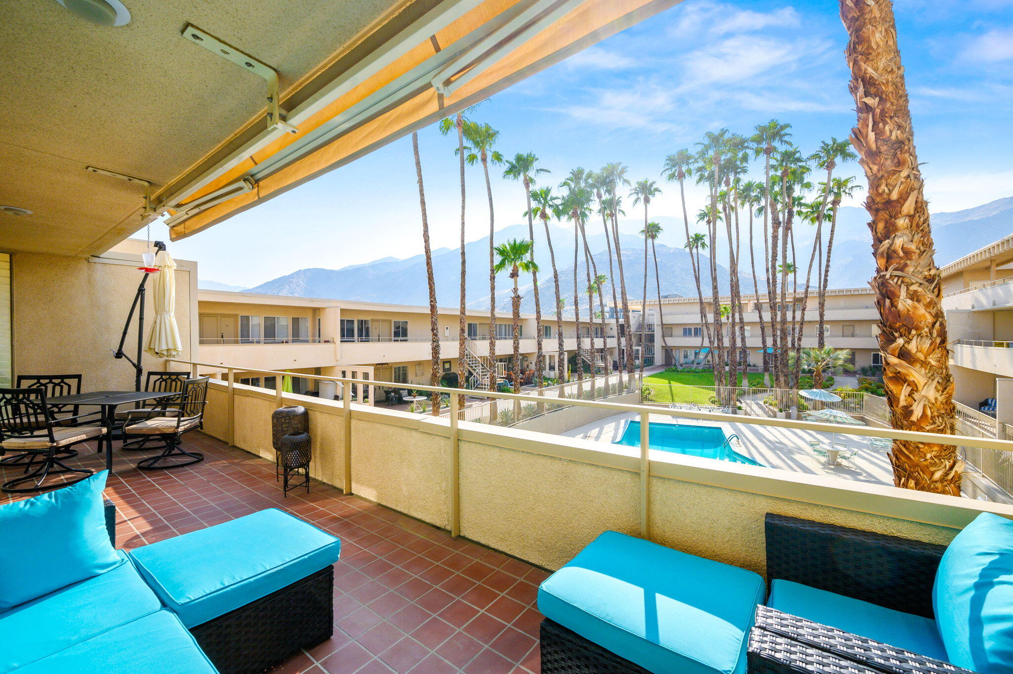 277 East Alejo Road, Unit 215 Palm Springs, CA 92262 - Photo 3 of 52 a room with furniture and a view of the house
